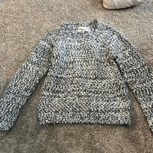 Fuzzy black and white sweater